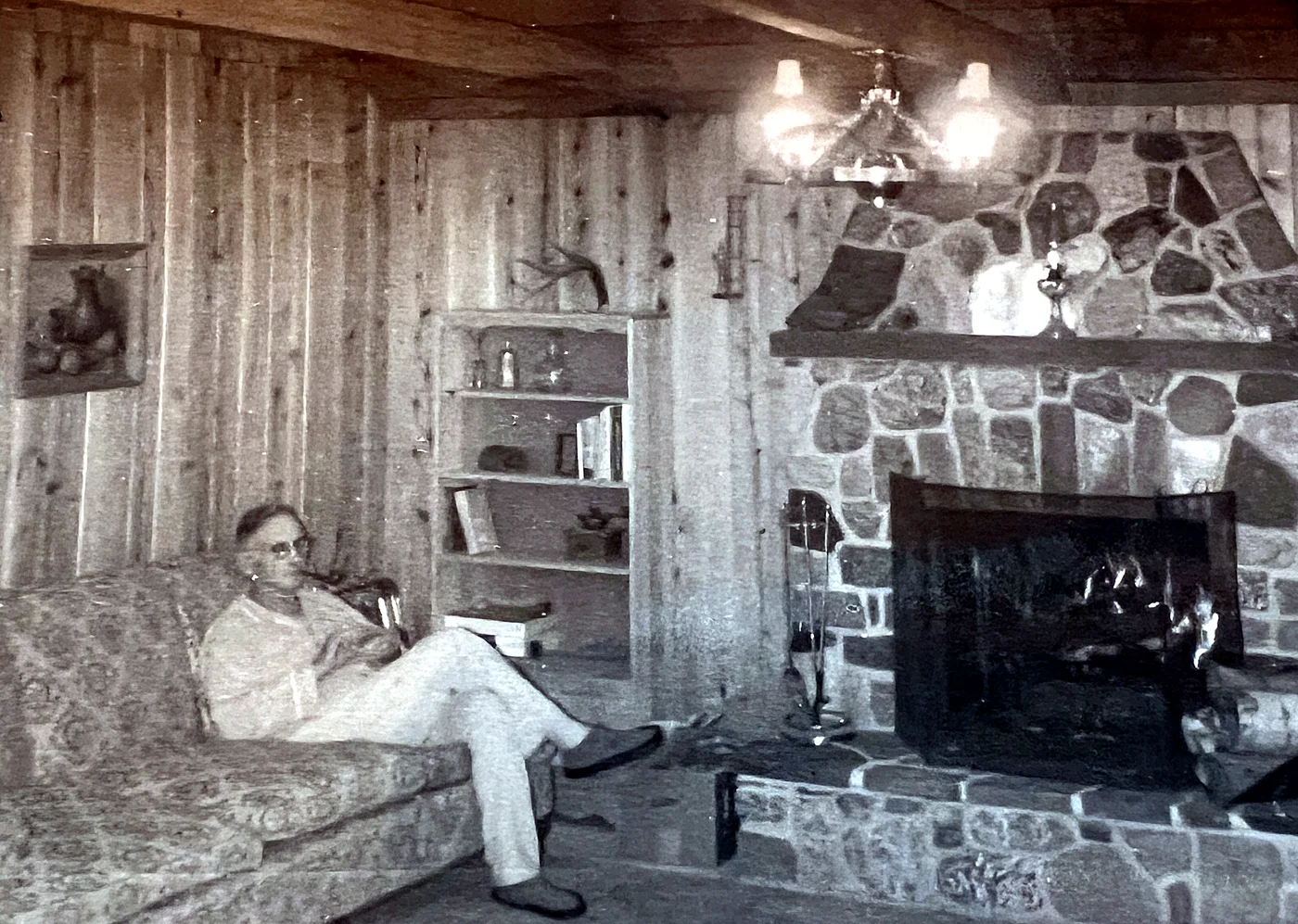 Fred in the same spot, pipe in hand.